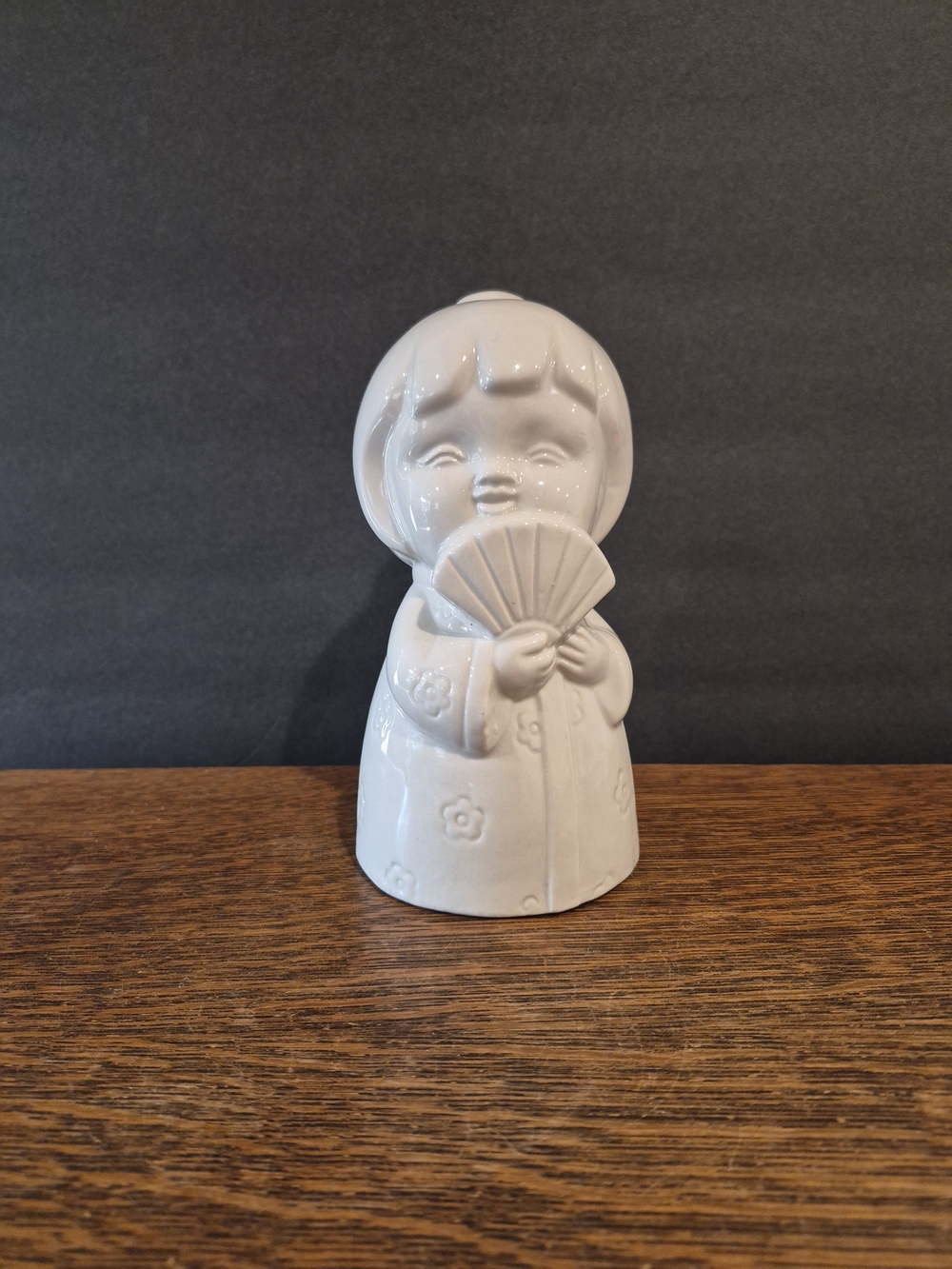 Collectible Benihana Sakura Girl Tiki Mug made of white ceramic.
